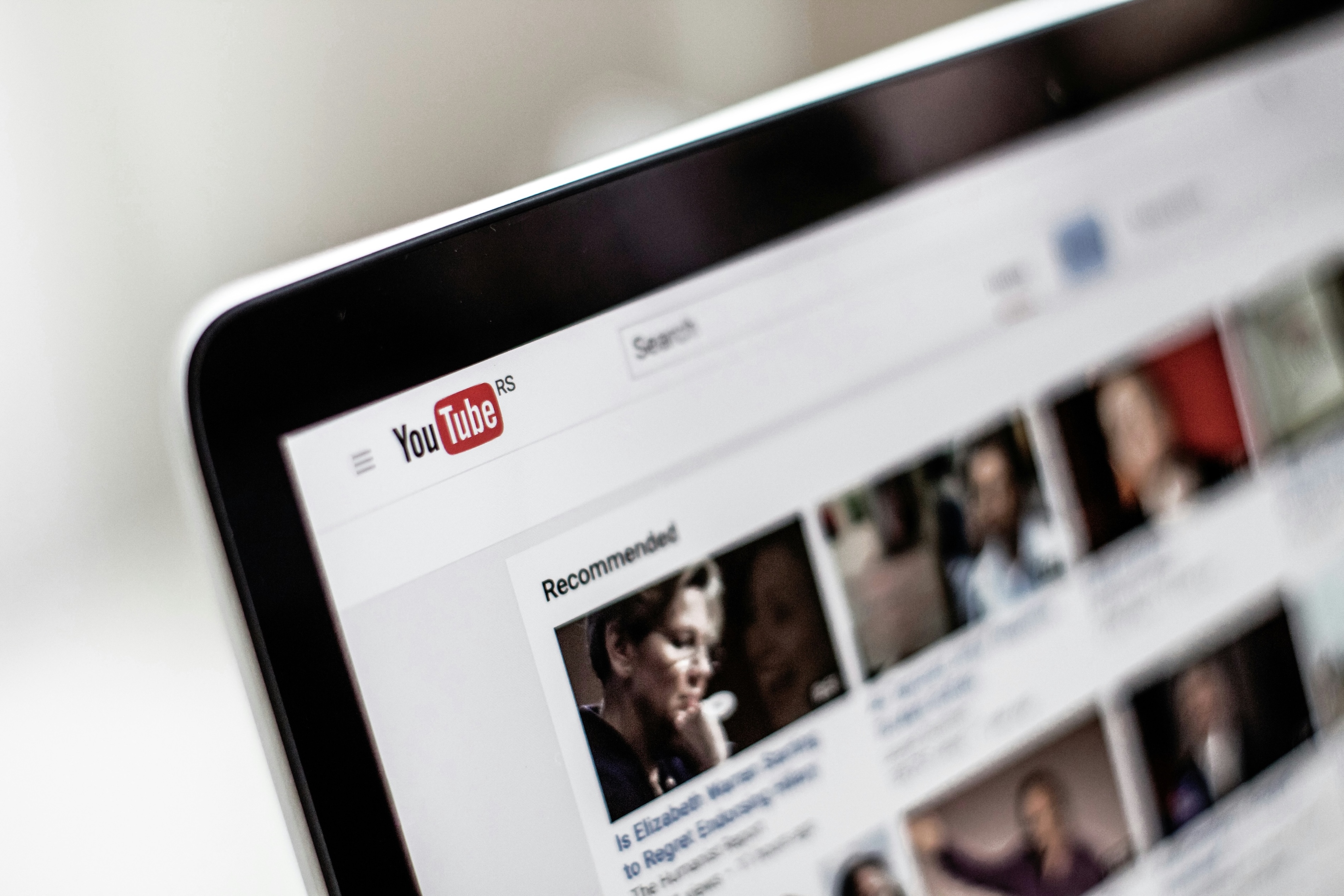 YouTube cover image on a laptop